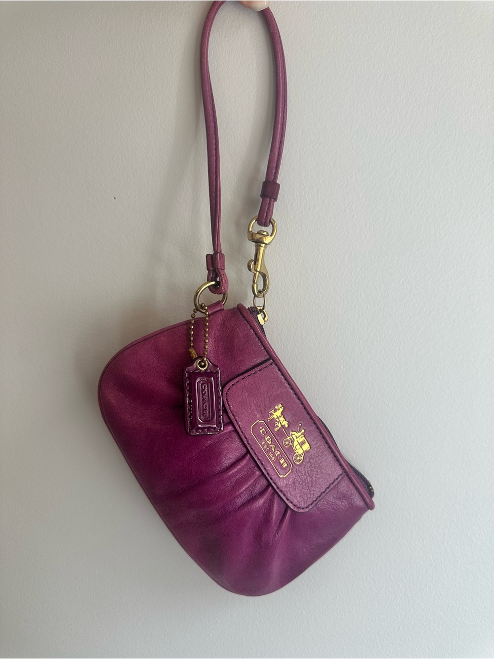 Coach Plum Leather Wristlet with Gold-Tone Logo